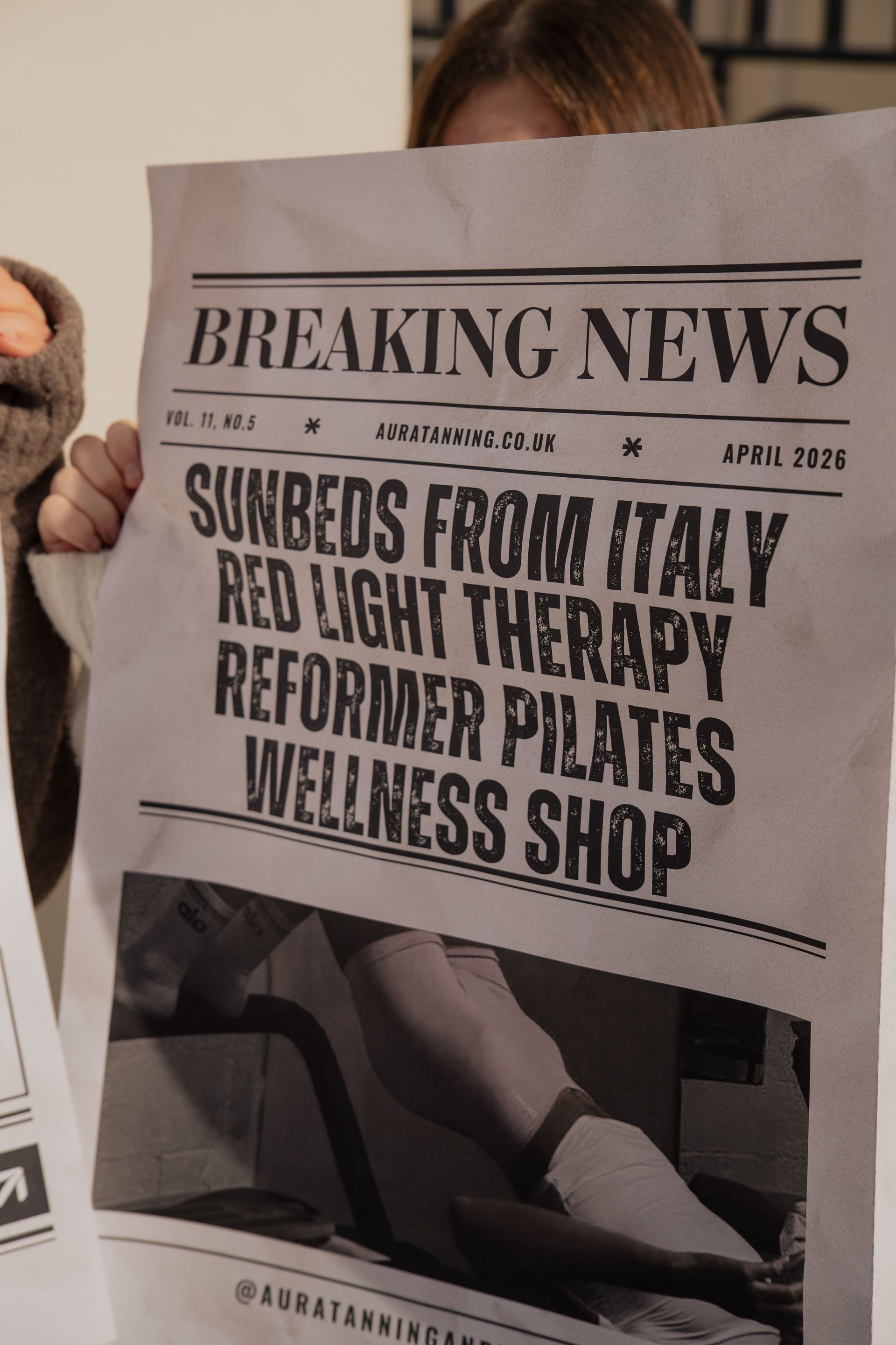 Sun hat, sunglasses, and tote bag by a pool.