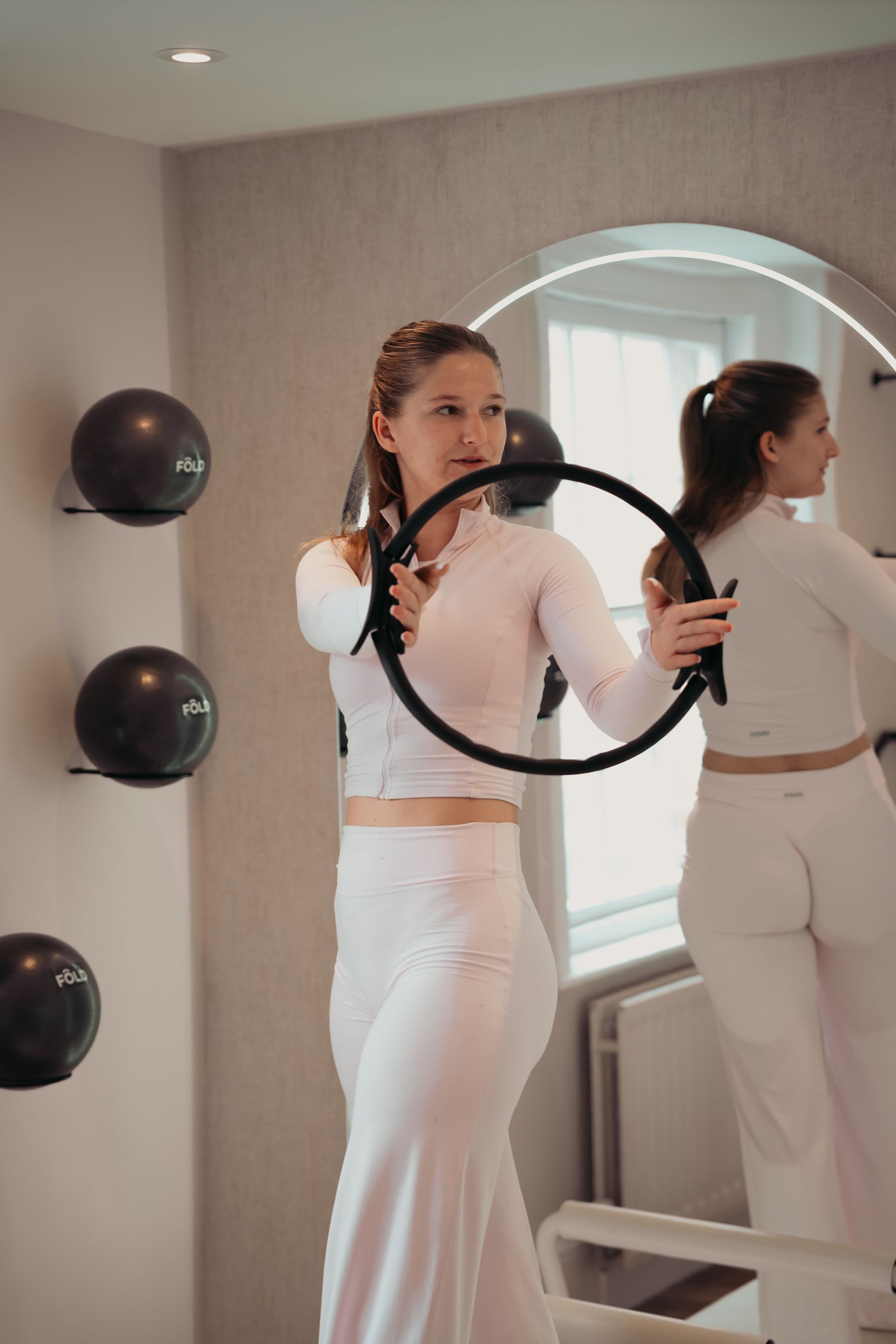 Close-up of a person's torso and hip in a light blue bikini bottom.