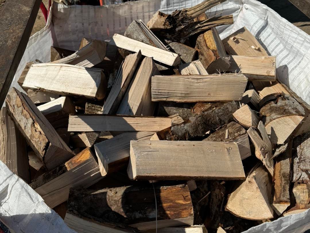 A bag of wood is sitting on a table.
