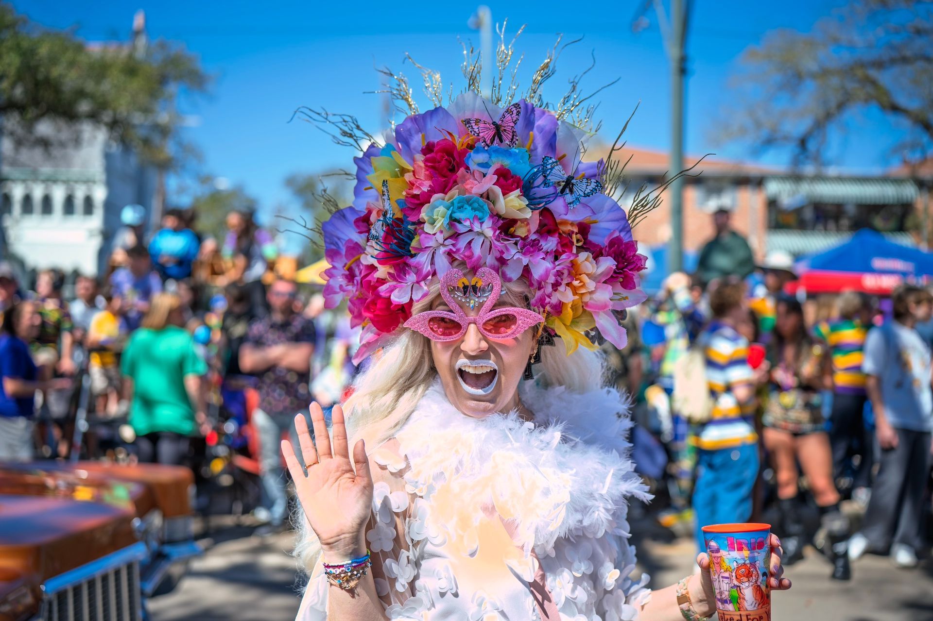 A black and white photo of a row of cars parked next to each other.