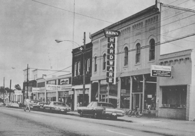 a black and white photo of a hardware store