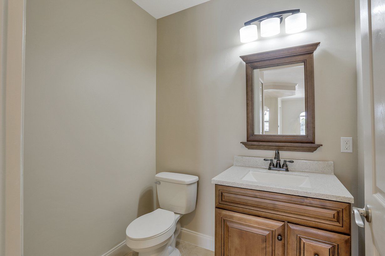 Wooden Cabinet and Toilet Bowl — Fort Myers, FL — Absolute Granite Inc.
