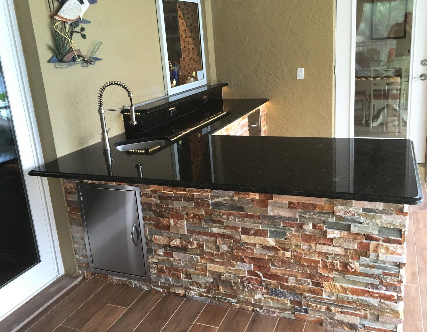 Black Marble Table with Faucet — Fort Myers, FL — Absolute Granite Inc.