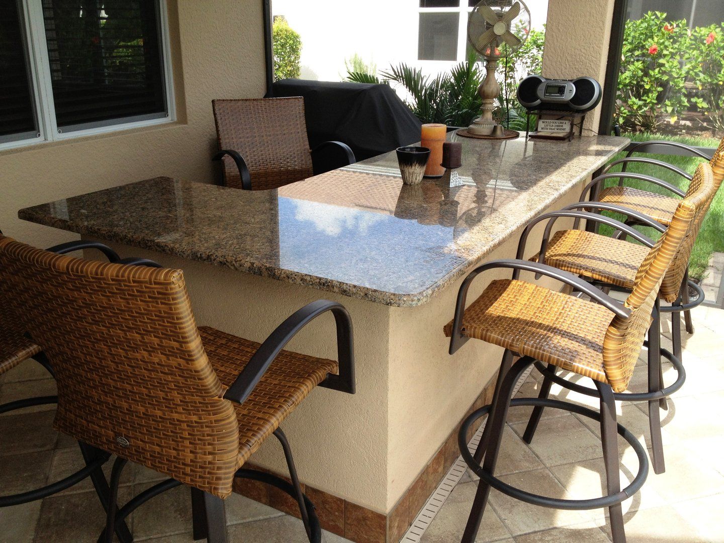 Marble Table with Orange Chairs — Fort Myers, FL — Absolute Granite Inc.