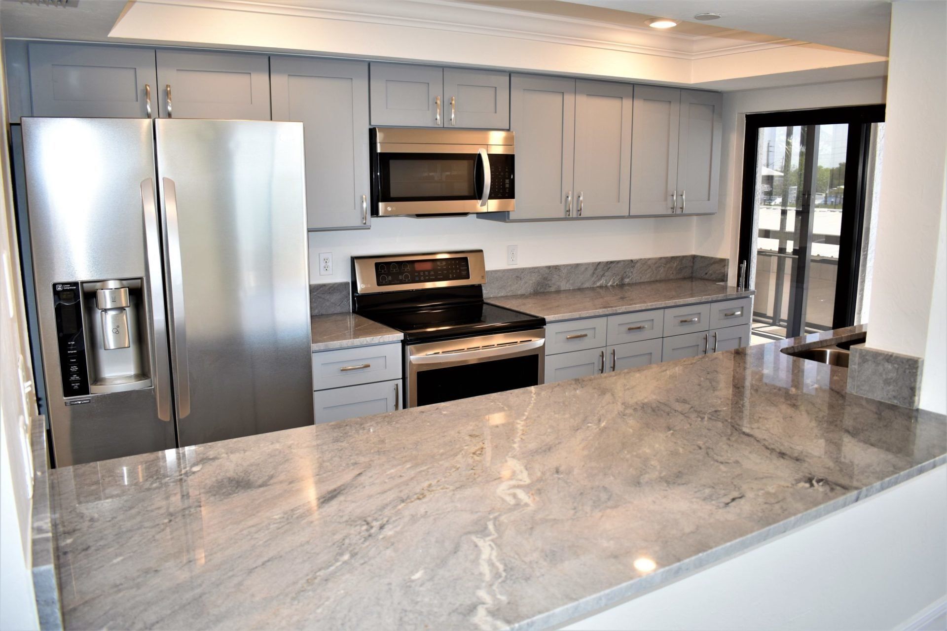 Marble Kitchen with Refrigerator — Fort Myers, FL — Absolute Granite Inc.