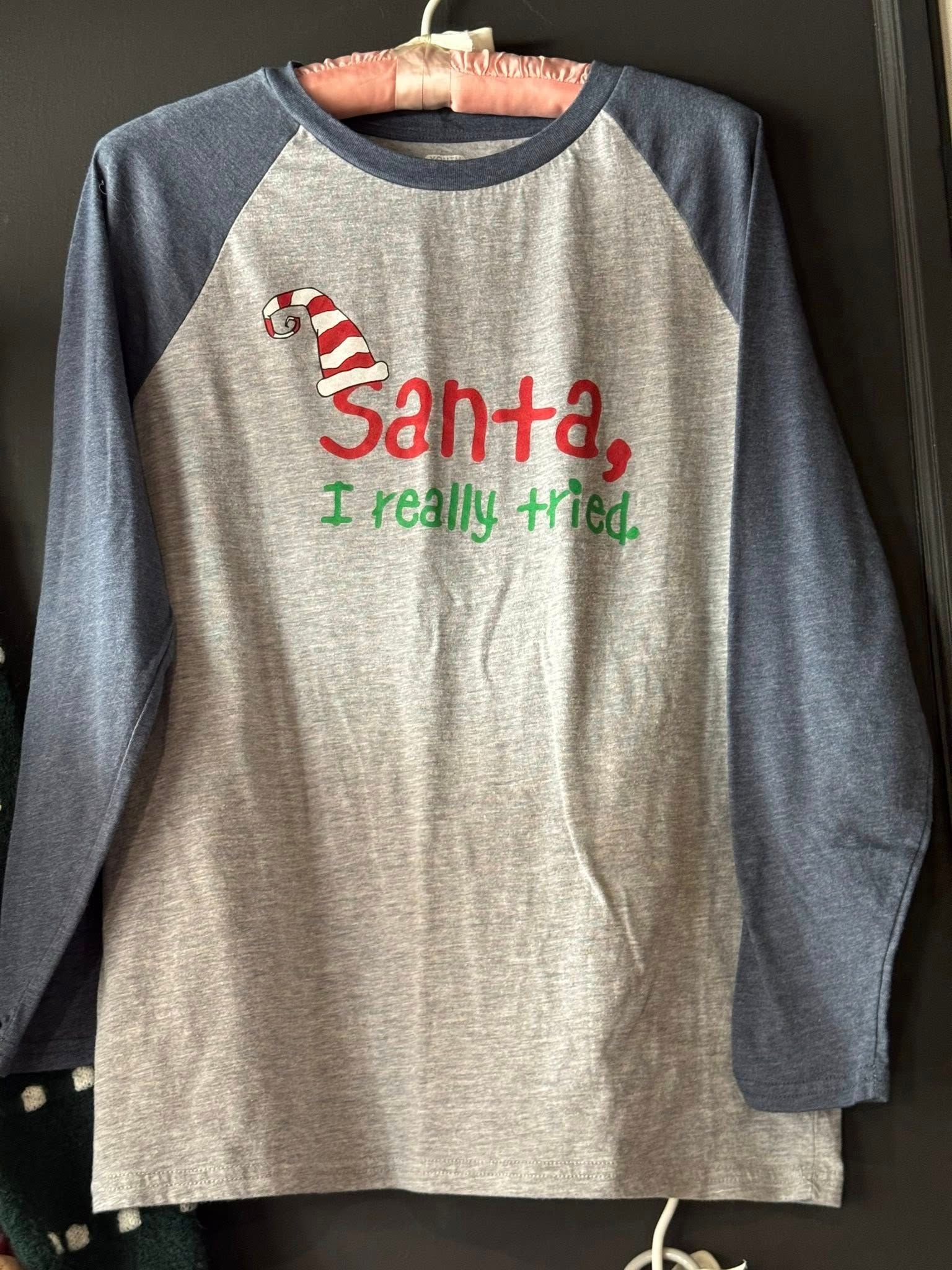 Gray and navy raglan shirt with Santa graphic and the words “Santa, I really tried.”