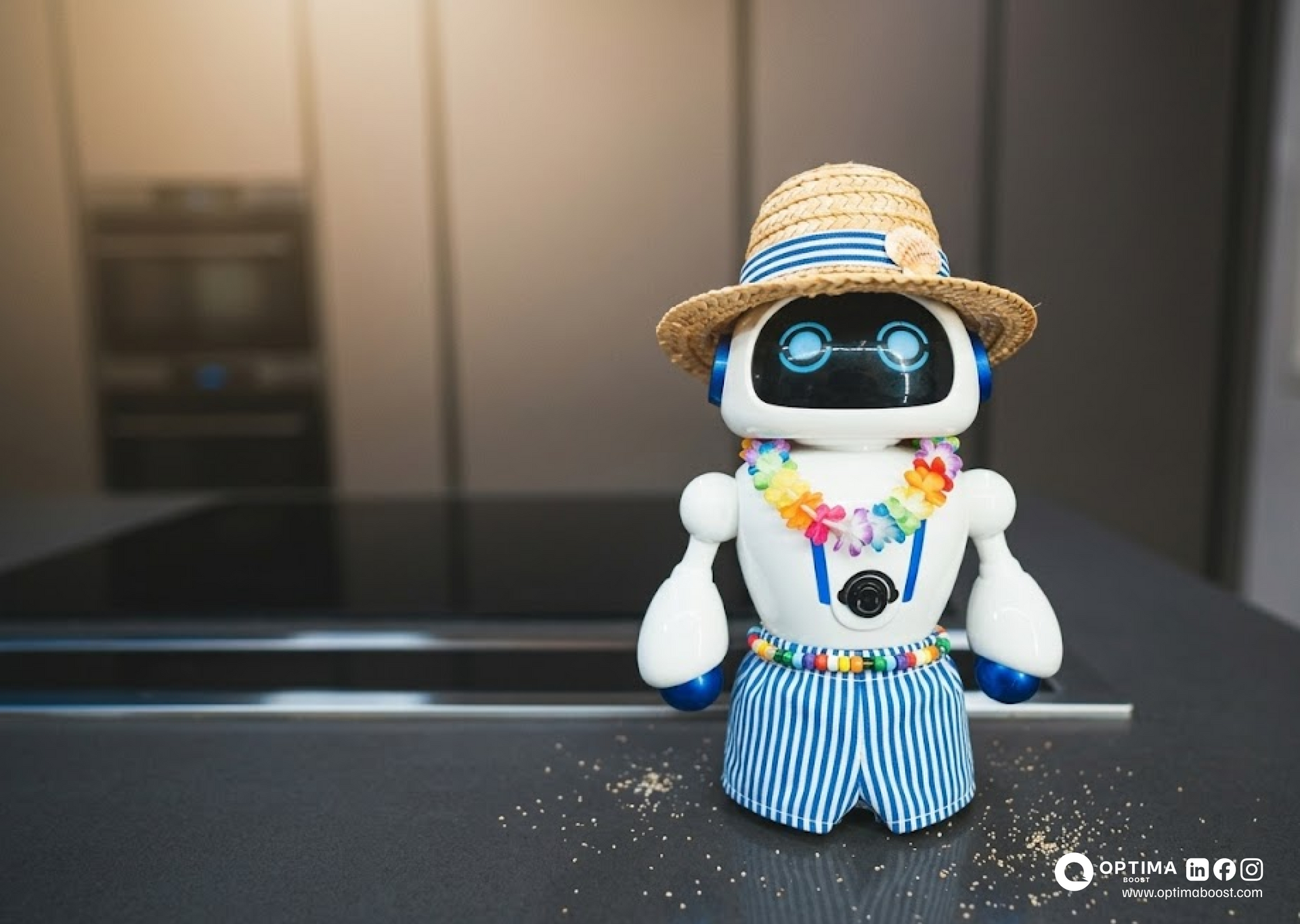 A small, white toy robot wearing a straw hat, a floral lei, and striped shorts, standing on a dark kitchen countertop.