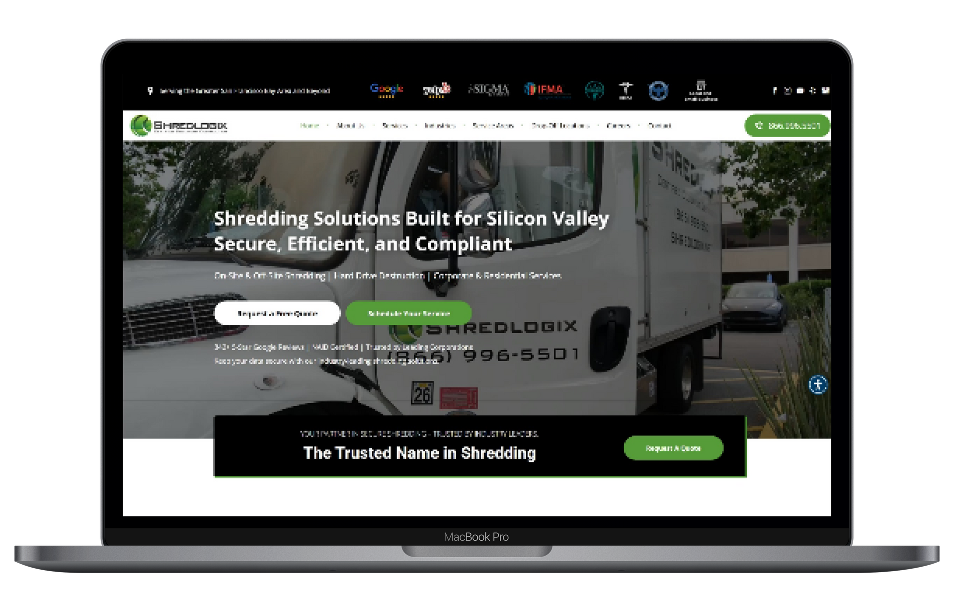 A laptop computer is open to a website with a truck on the screen.