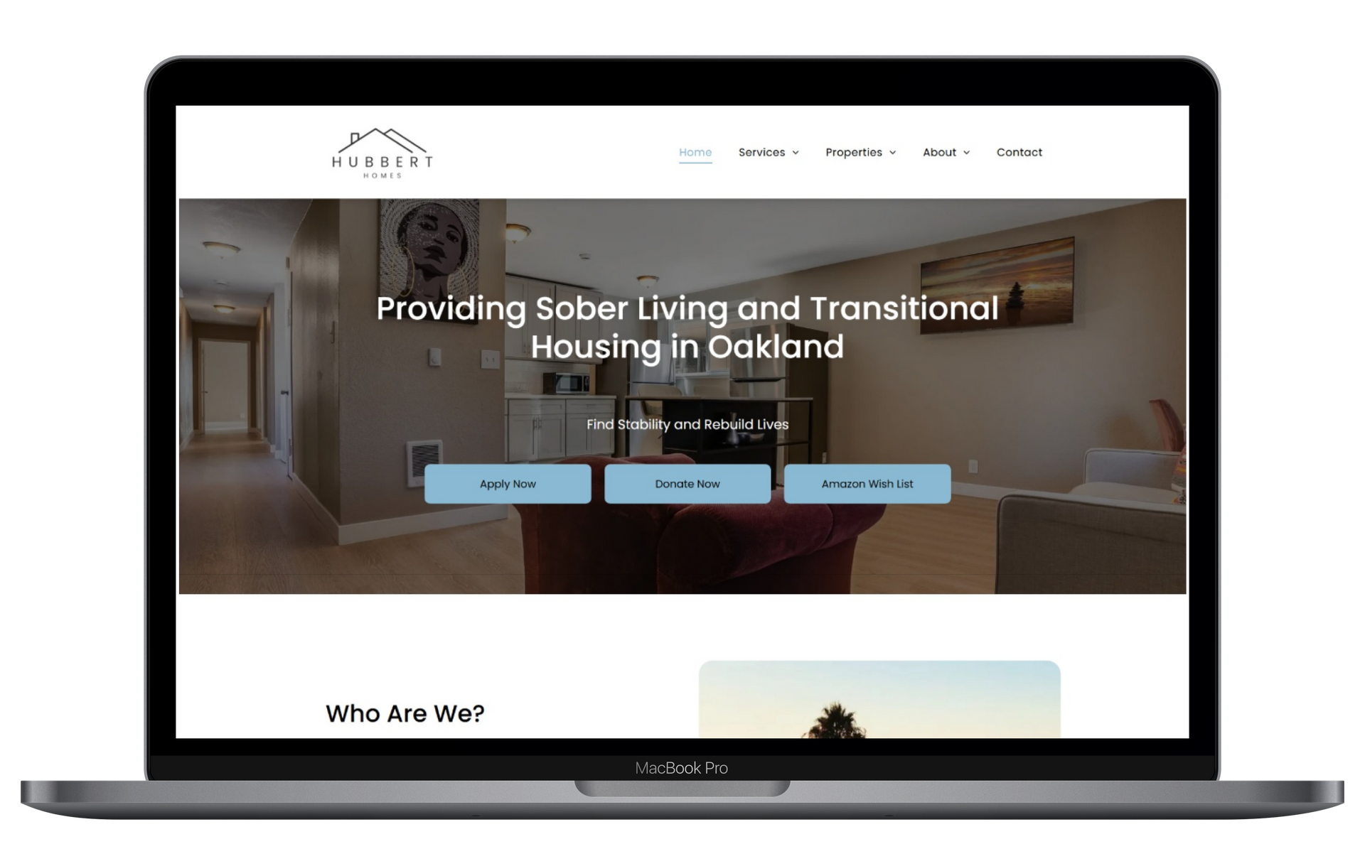 A laptop computer is open to a website for providing sober living and transitional housing in oakland.