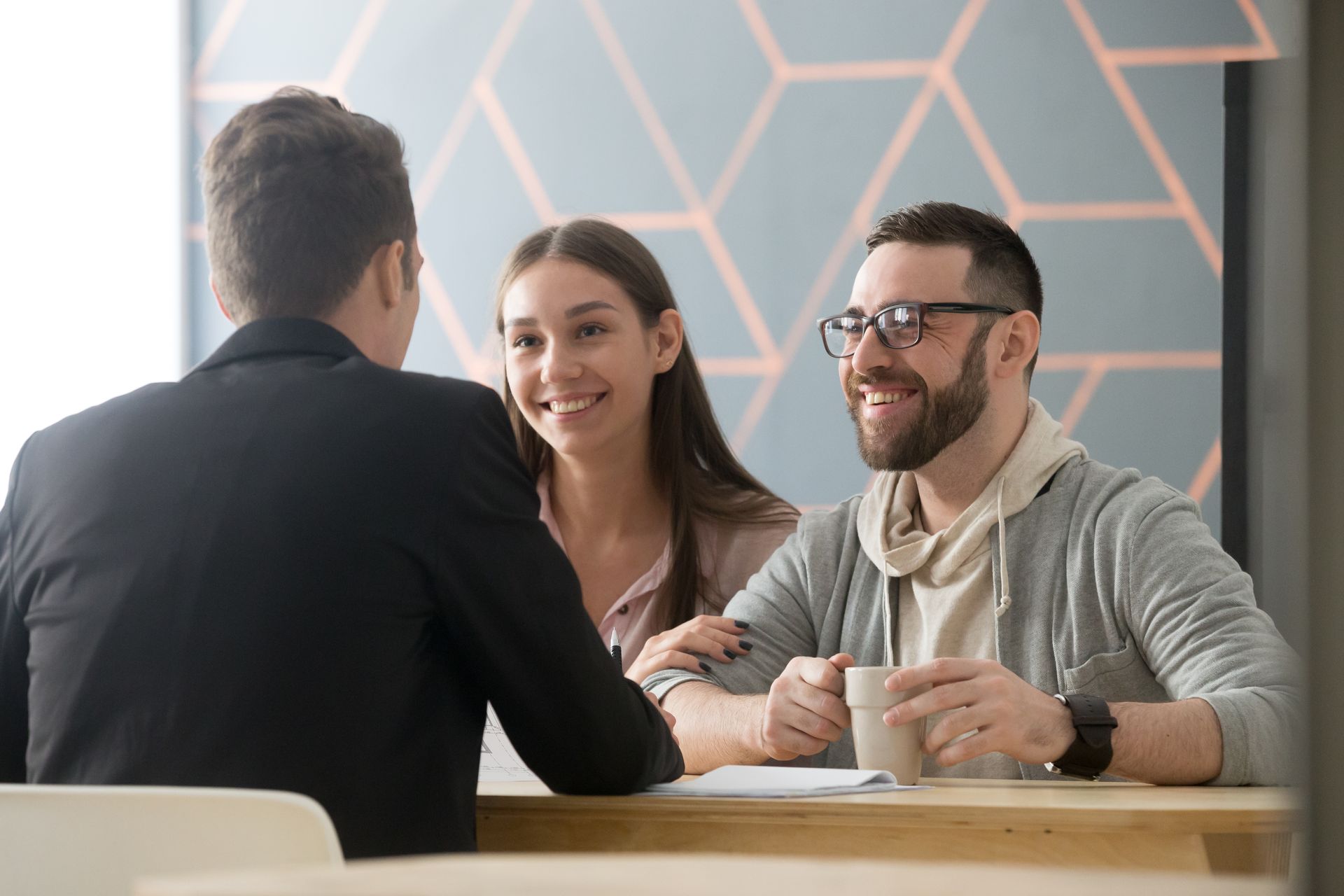 financial planner helping a younger couple