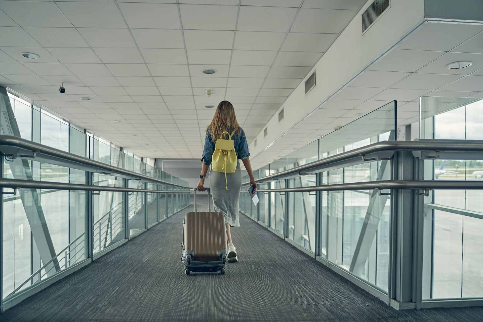 Woman walking with luggage