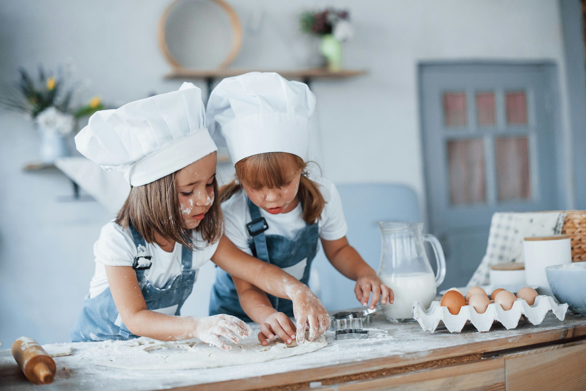 Two kids in a baking class