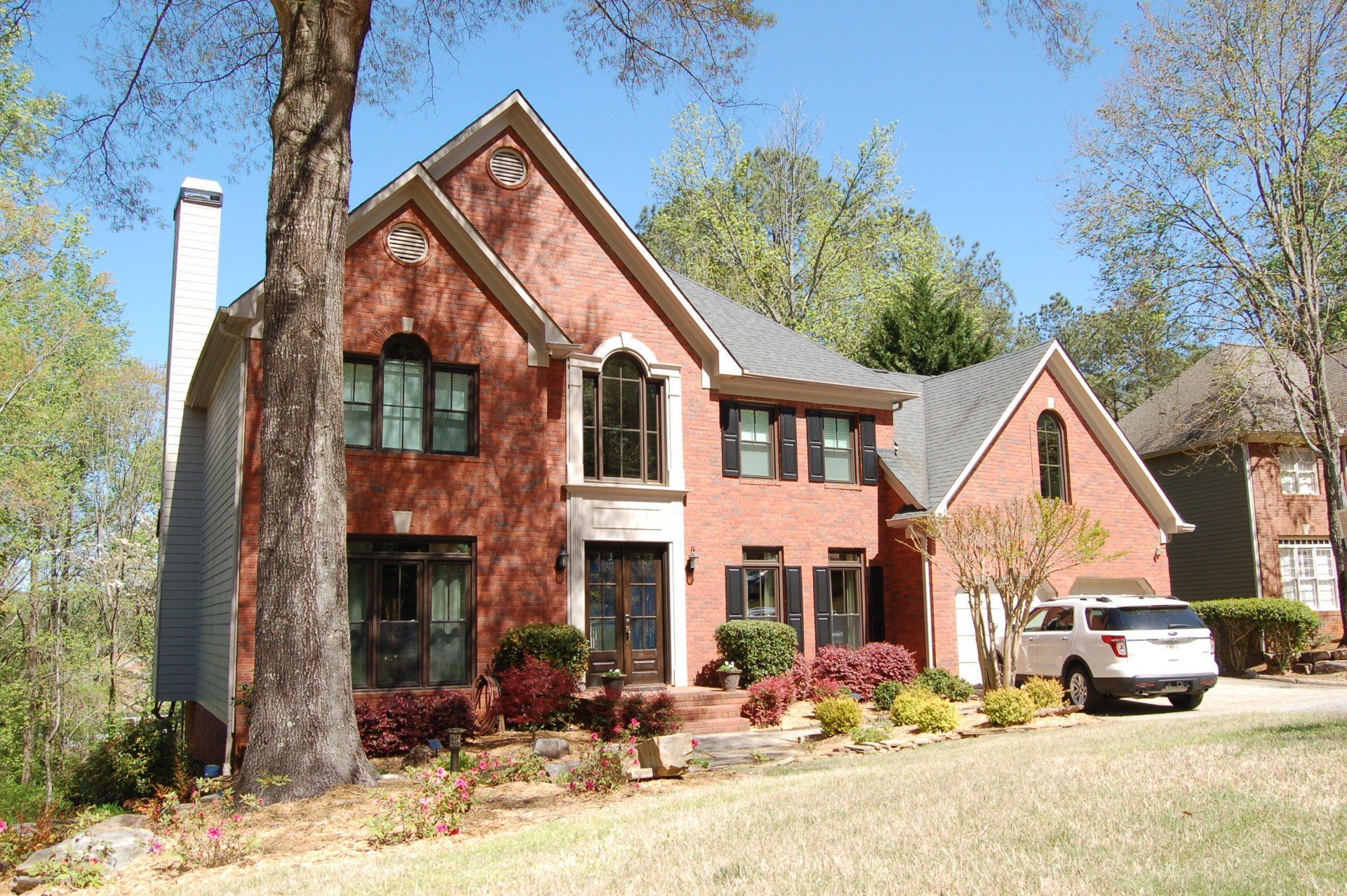 Large Tree On The Left And House — Tucker, GA — Quinn Windows
