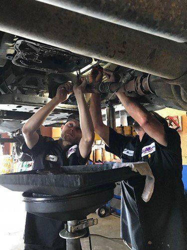 Two Auto Mechanic Man Repairing the Car — Oakdale, CA — AG Transmission Repair