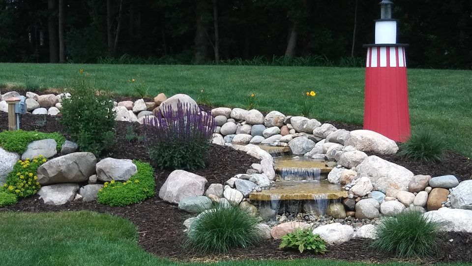 Nice water feature with waterfall — Clarkston, MI — Lowries Landscape Inc