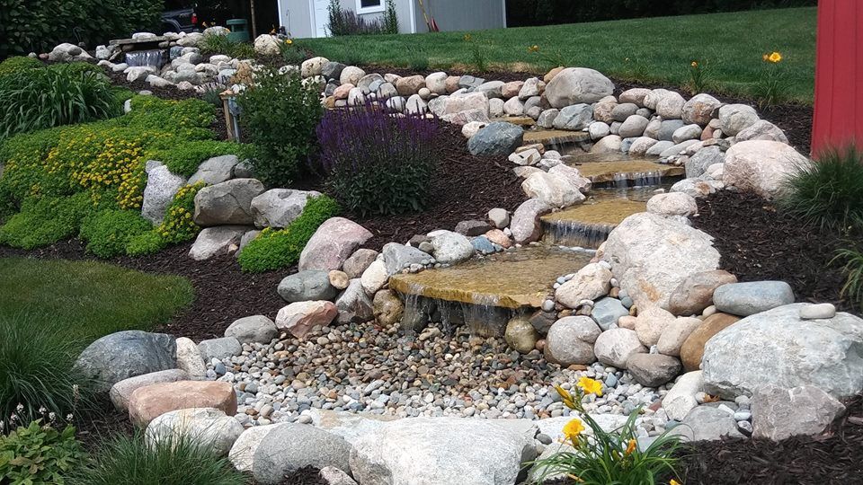 Different angle of water feature with waterfall — Clarkston, MI — Lowries Landscape Inc