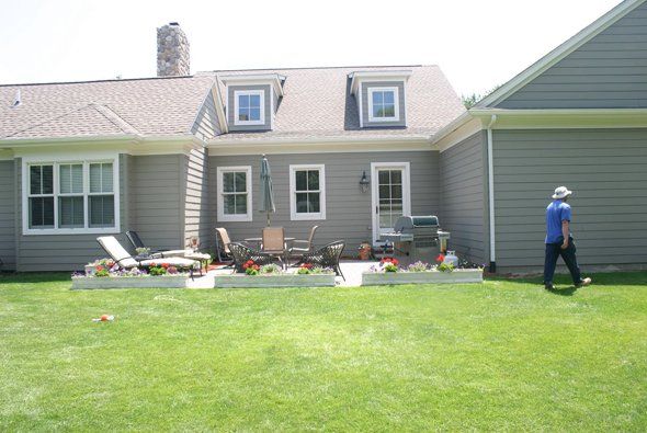 Before landscaping change of area around house — Clarkston, MI — Lowries Landscape Inc