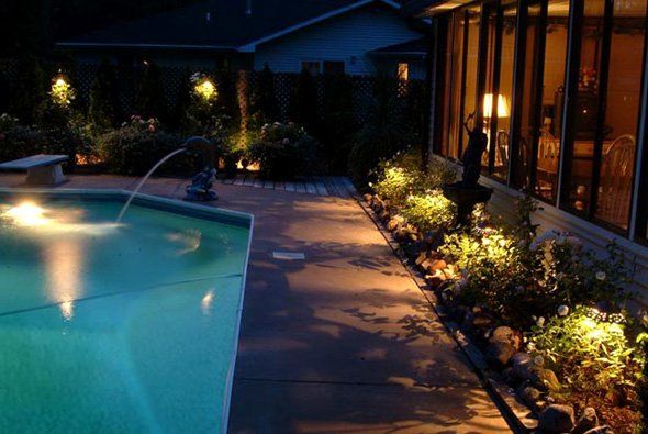 Nice lighting around pool — Clarkston, MI — Lowries Landscape Inc