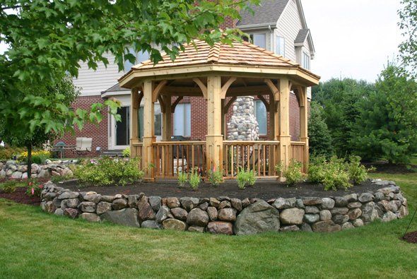 Gazebo around small plants and dirt — Clarkston, MI — Lowries Landscape Inc