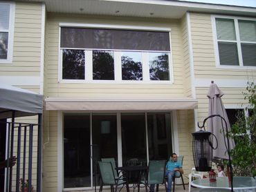 Window Solar Screens ─ Drop Down Curtain with Windows in Tallahassee, FL