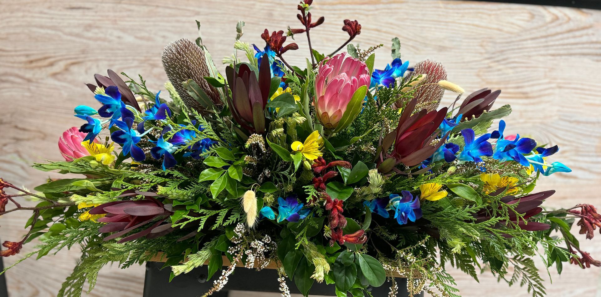 Floral Arrangement Featuring Blue Orchids, Burgundy and Pink Flowers — J'adore Flowers & Gifts Cairns In Earlville, QLD