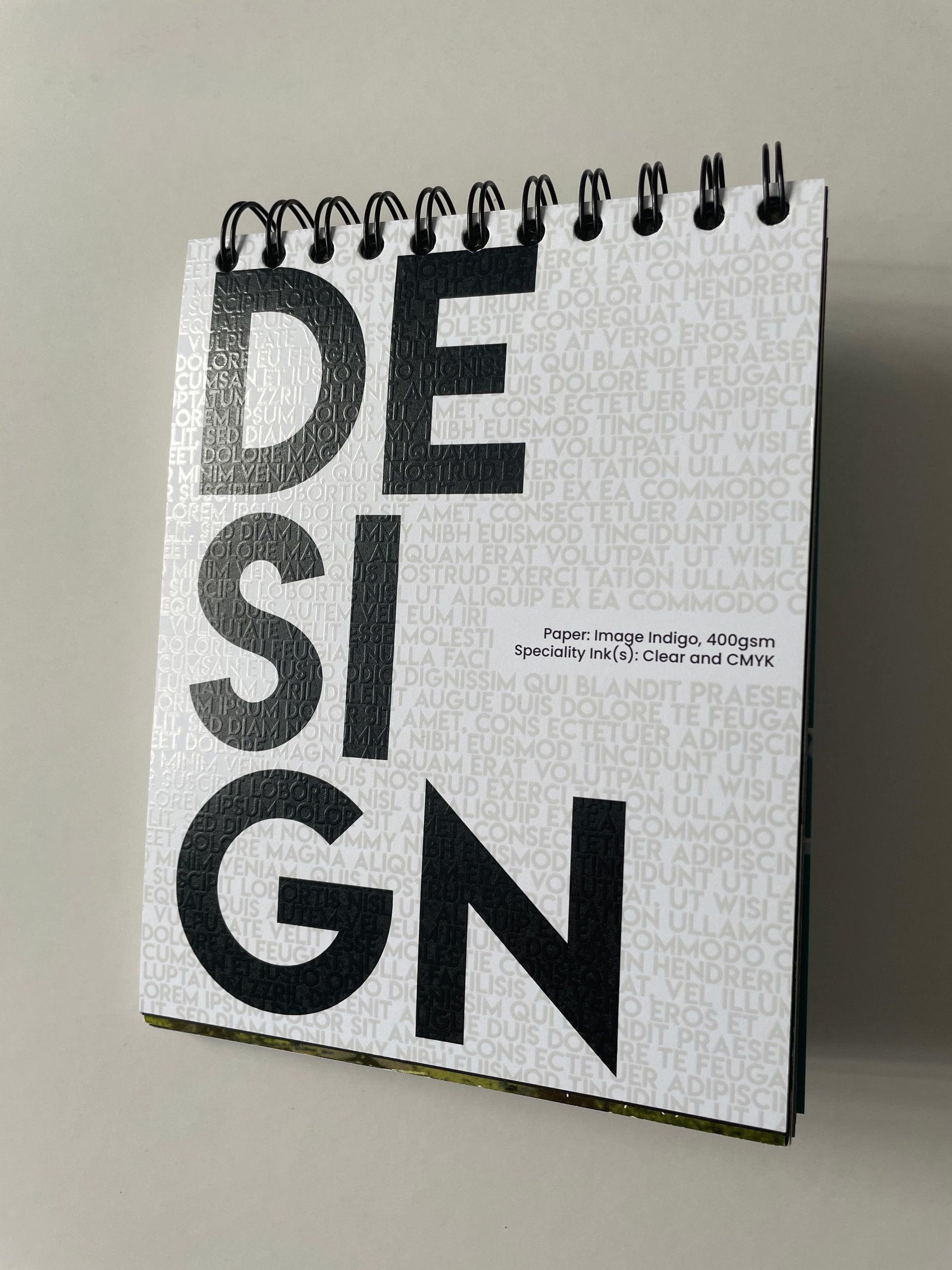 A spiral-bound notepad with