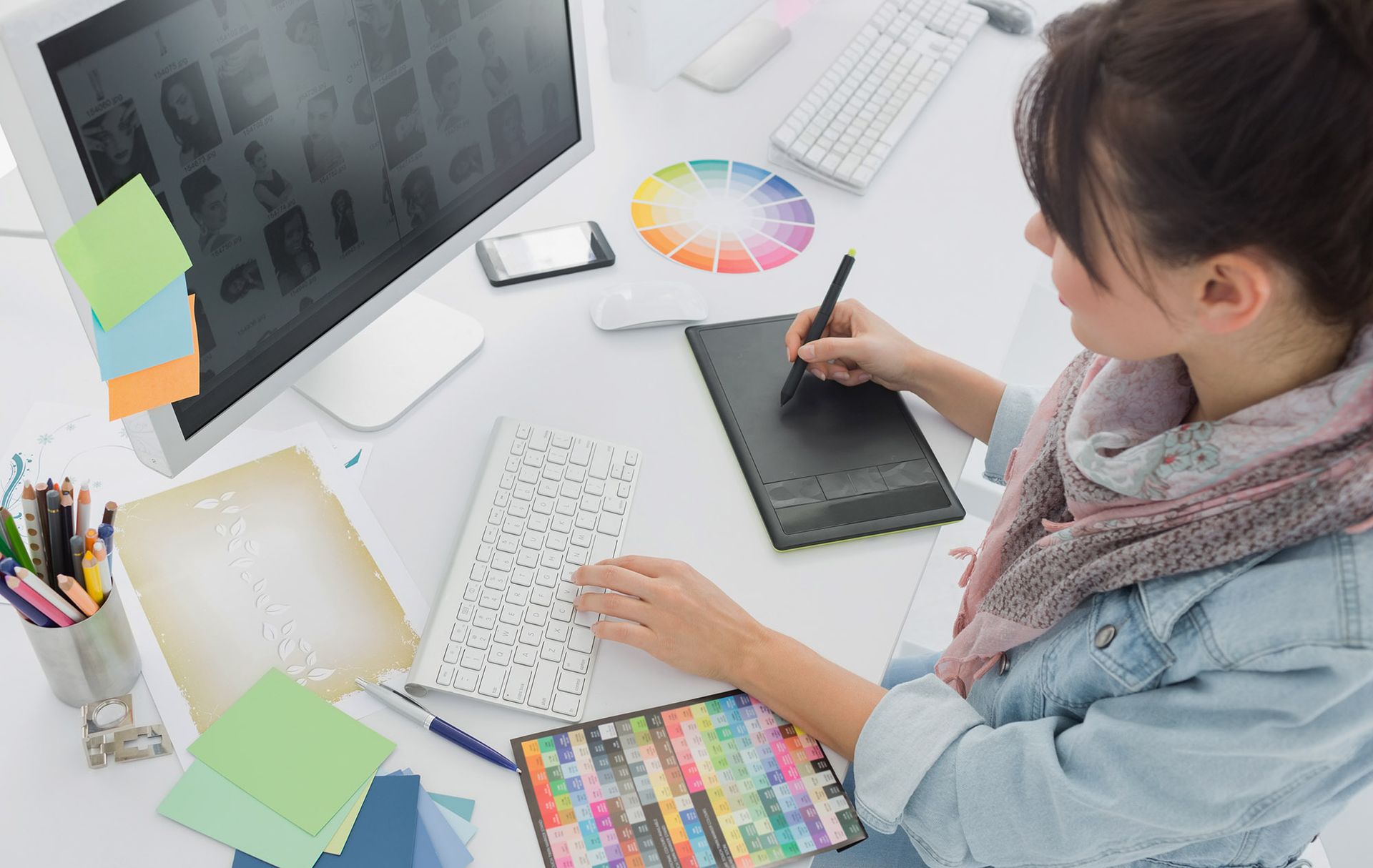 lady doing graphic design for print