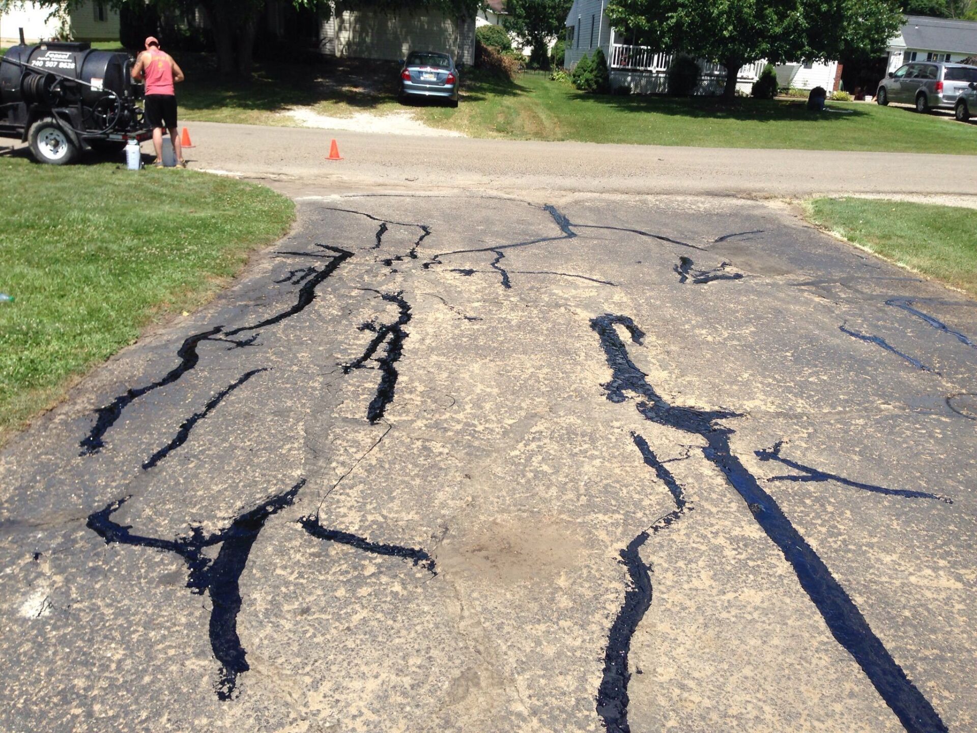 Sealing Joint Crack In Asphalt Road — Vernon, OH — Feasel Asphalt Maintenance