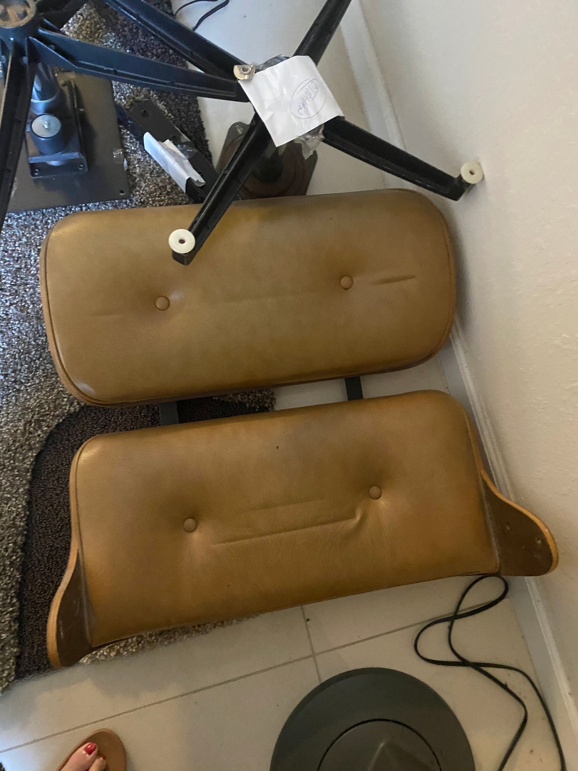 A chair is sitting on the floor next to a table.