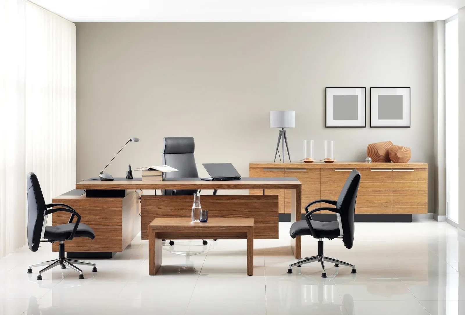 Modern office with wood desk, chairs, and credenza, neutral walls, and a glossy white floor.