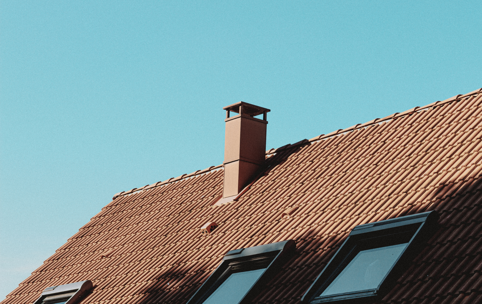 A roof with a chimney on top of it