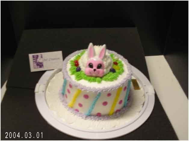 Easter cake with bunny and colorful frosting.