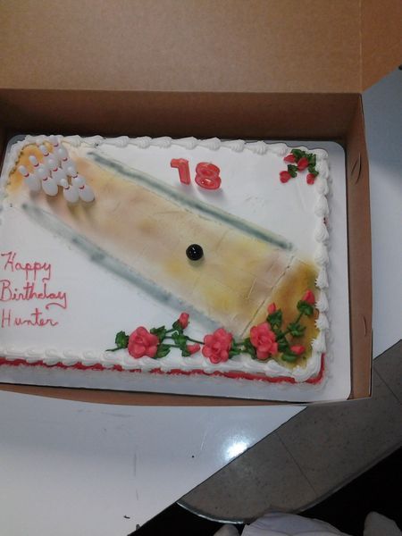 Cake decorated as a bowling lane, says 