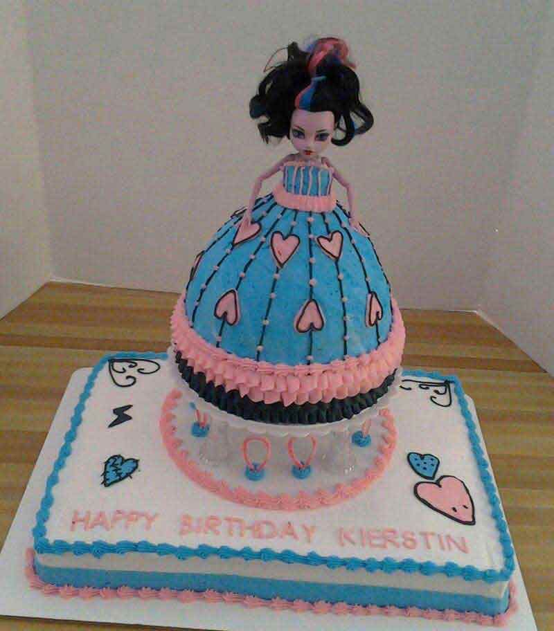 Monster High doll cake with pink and blue frosting, and 