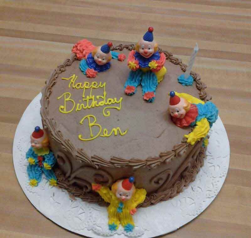 Chocolate cake with clown decorations, 