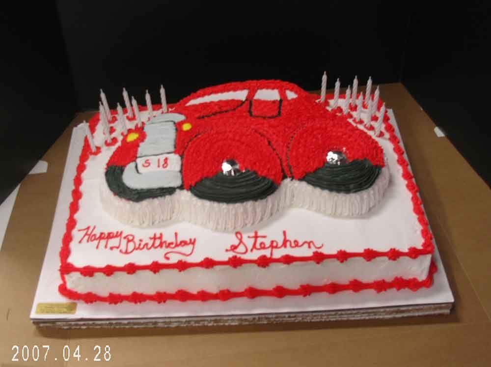 Red car-shaped birthday cake with 