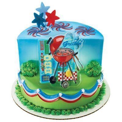 Cake decorated for a barbecue, with a grill, red, white, and blue colors, and star toppers.