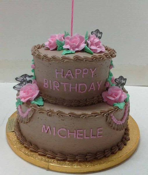 Two-tiered chocolate cake with pink roses, 