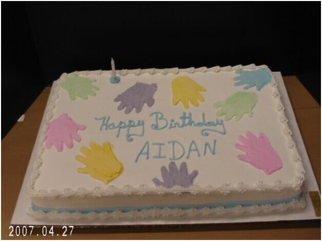 Rectangular birthday cake with handprints, 