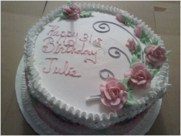 Cake decorated with pink roses and 