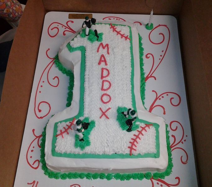 Baseball-themed birthday cake in the shape of the number 