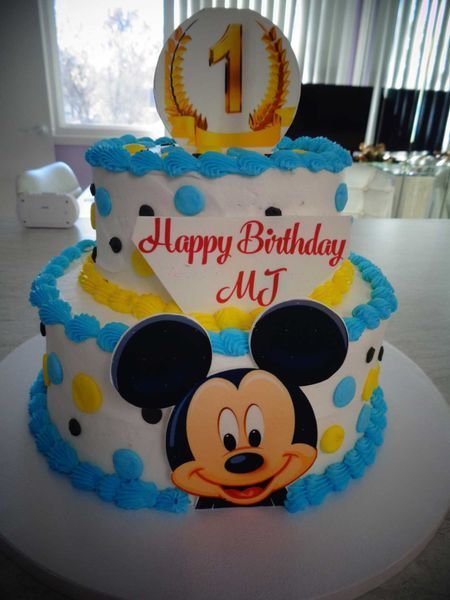 Two-tier birthday cake with Mickey Mouse decoration, 