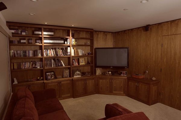 A living room with a couch and a flat screen tv