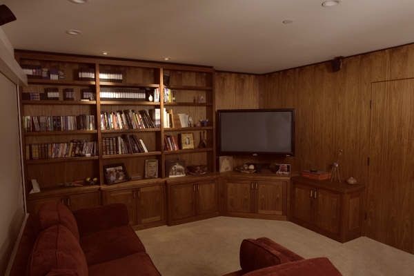 A living room with a couch and a flat screen tv