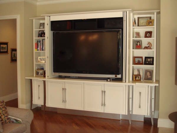A living room with a large flat screen tv