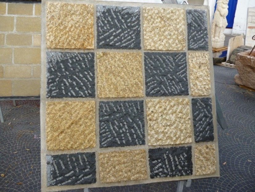 Una piastrella che ha un motivo a scacchi