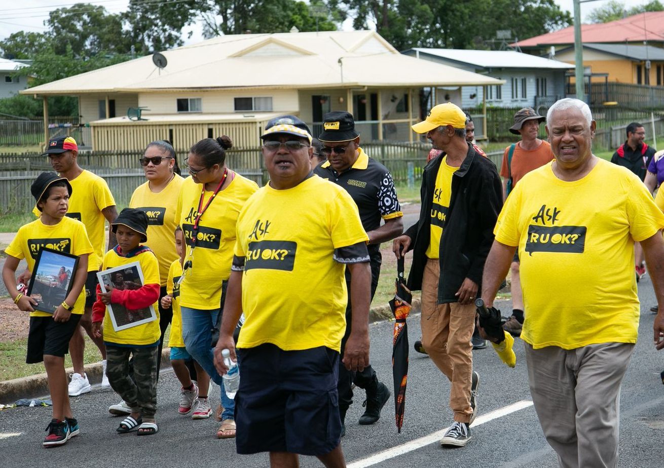 The Cherbourg community marching