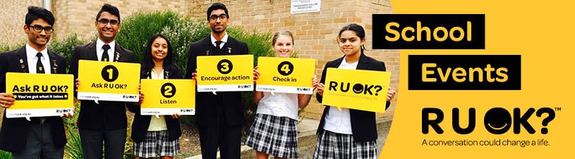 Group of High School students holding R U OK Signs