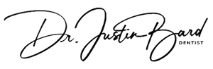 Dr. Justin Bard, Dentist, in elegant cursive handwriting.