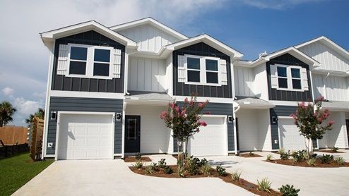 Coastal Tide Escapes – Front of the Vacation Home Front exterior of Coastal Tide Escapes vacation rental in Panama City Beach, featuring private entry, modern design, and family-friendly accommodations.